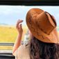 A tourist on game drive in Amboseli Kenya jpg